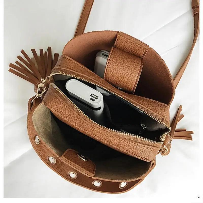 Nouveau sac seau de gommage à la mode pour femmes, sac bandoulière vintage à pompon, sac à bandoulière de haute qualité, sac à bandoulière simple pour femmes