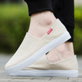 Nouvelles chaussures décontractées plates en toile pour hommes et femmes Chaussures élégantes légères Baskets décontractées pour hommes Baskets blanches modernes et confortables