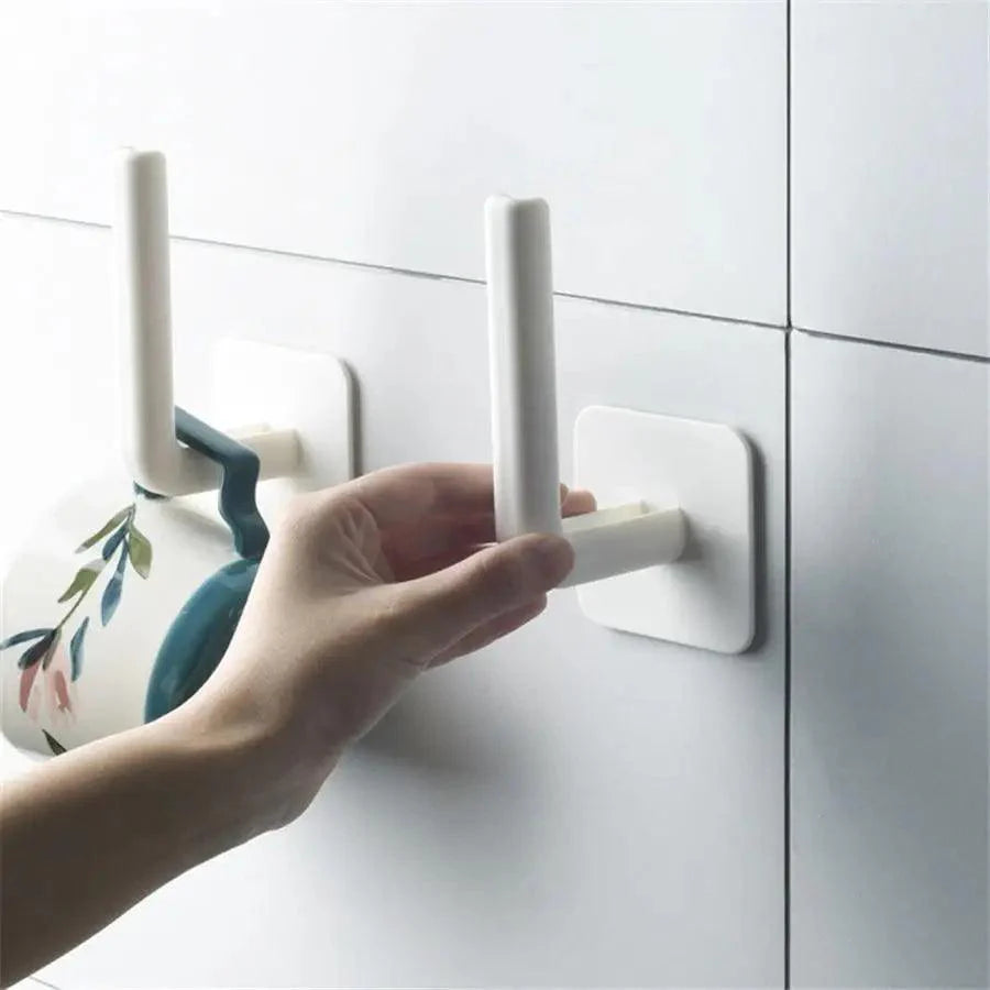 Nouveau Vigorous 1pc Accessoires de cuisine auto-adhésifs sous l'armoire Porte-rouleau de papier Support de serviette Cintre à mouchoirs Rangement pour salle de bain Toilettes