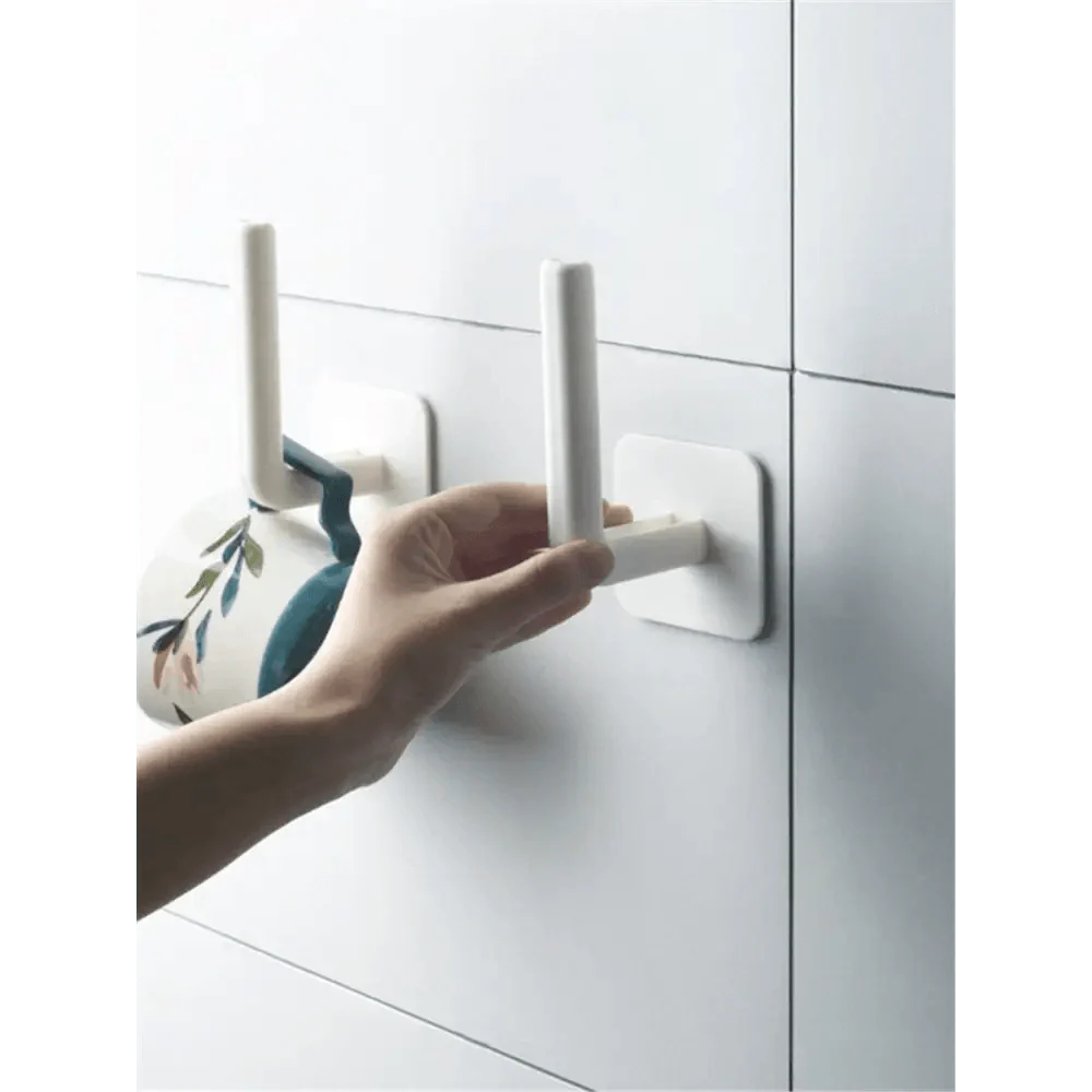 Nouveau Vigorous 1pc Accessoires de cuisine auto-adhésifs sous l'armoire Porte-rouleau de papier Support de serviette Cintre à mouchoirs Rangement pour salle de bain Toilettes