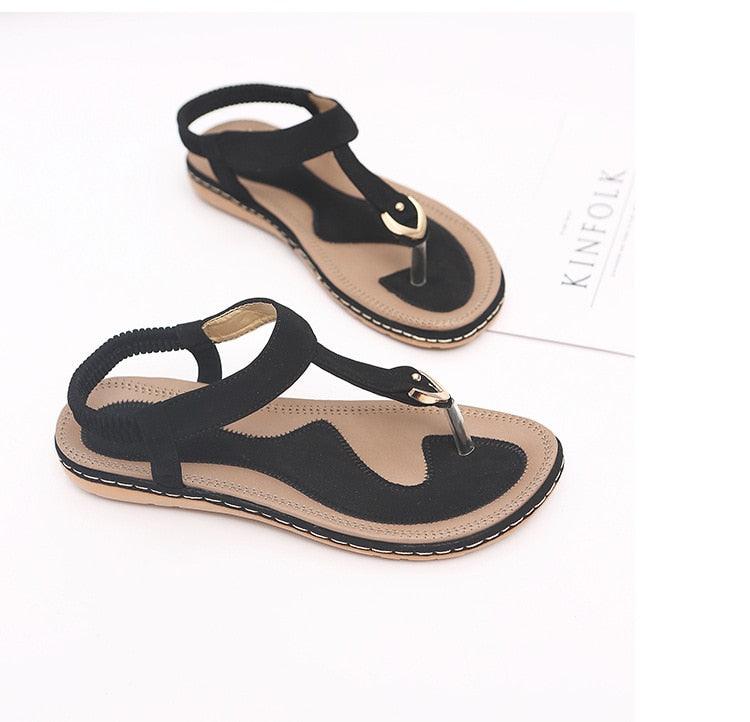 Nouvelles sandales plates pour femme, tongs décontractées d'été, chaussures simples pour femme, pantoufles à semelle souple, tongs élastiques et confortables à lanières en T, chaussures de plage