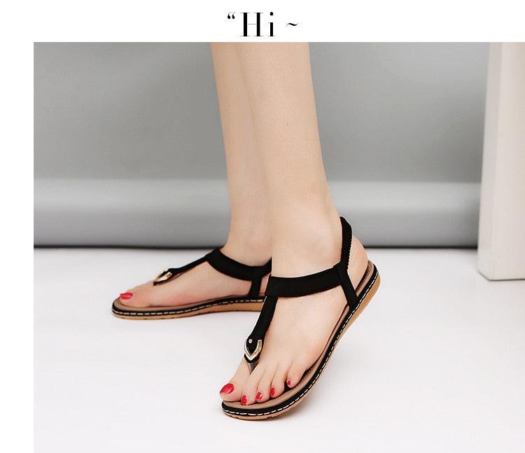 Nouvelles sandales plates pour femme, tongs décontractées d'été, chaussures simples pour femme, pantoufles à semelle souple, tongs élastiques et confortables à lanières en T, chaussures de plage