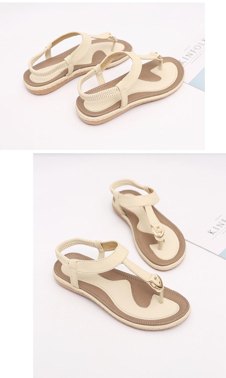 Nouvelles sandales plates pour femme, tongs décontractées d'été, chaussures simples pour femme, pantoufles à semelle souple, tongs élastiques et confortables à lanières en T, chaussures de plage