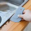 Outil racloir souple de cuisine en forme de pingouin pour enlever les taches