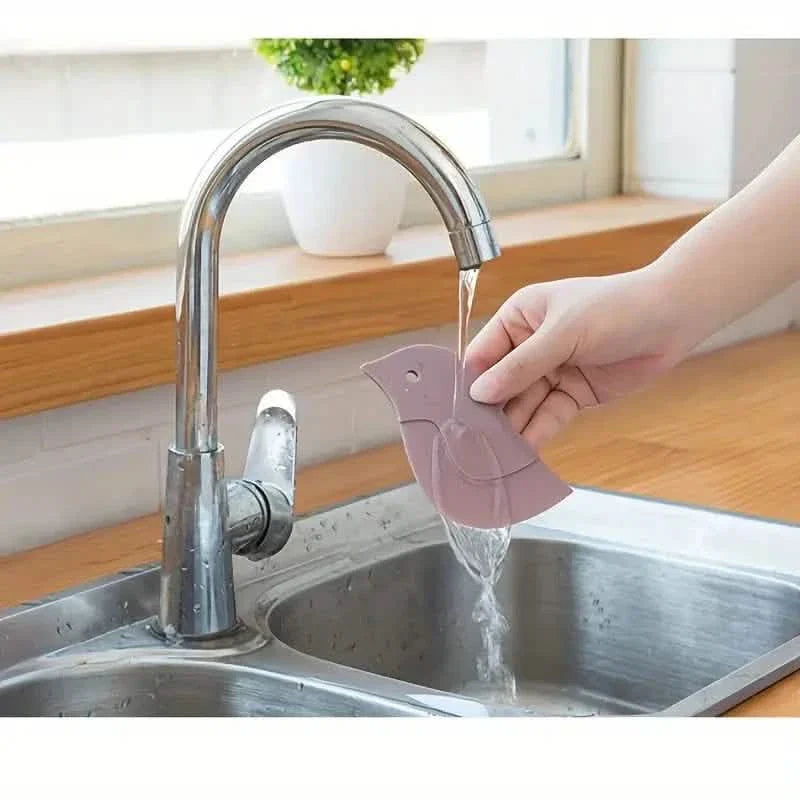 Outil racloir souple de cuisine en forme de pingouin pour enlever les taches