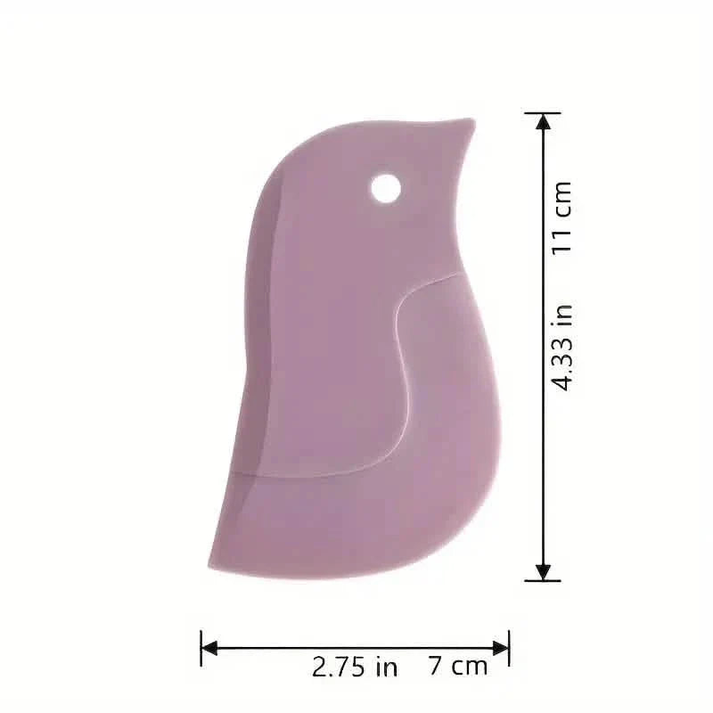 Outil racloir souple de cuisine en forme de pingouin pour enlever les taches