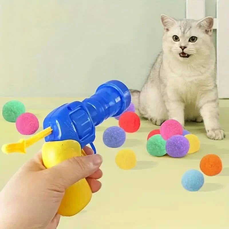 Pistolet tireur de balles en peluche