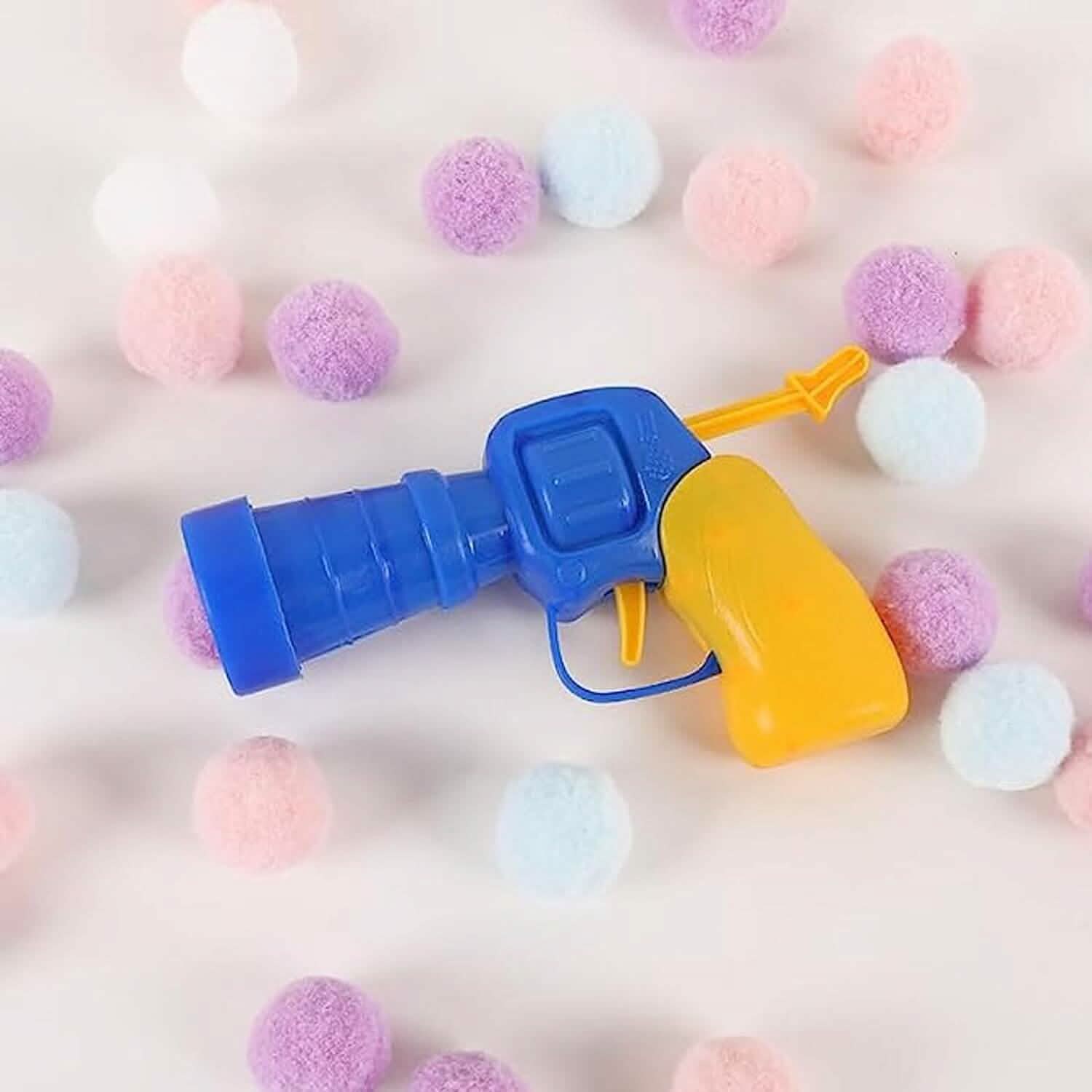 Pistolet tireur de balles en peluche