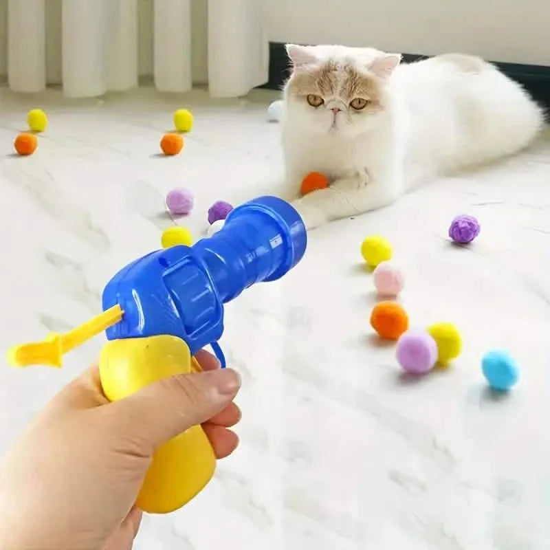 Pistolet tireur de balles en peluche