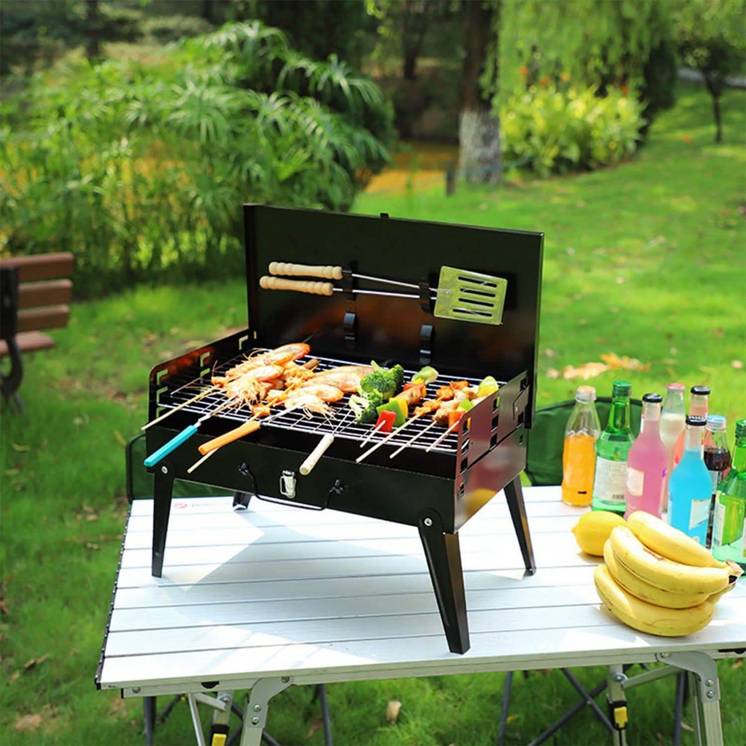 Barbecue portable au charbon pliable en forme de valise