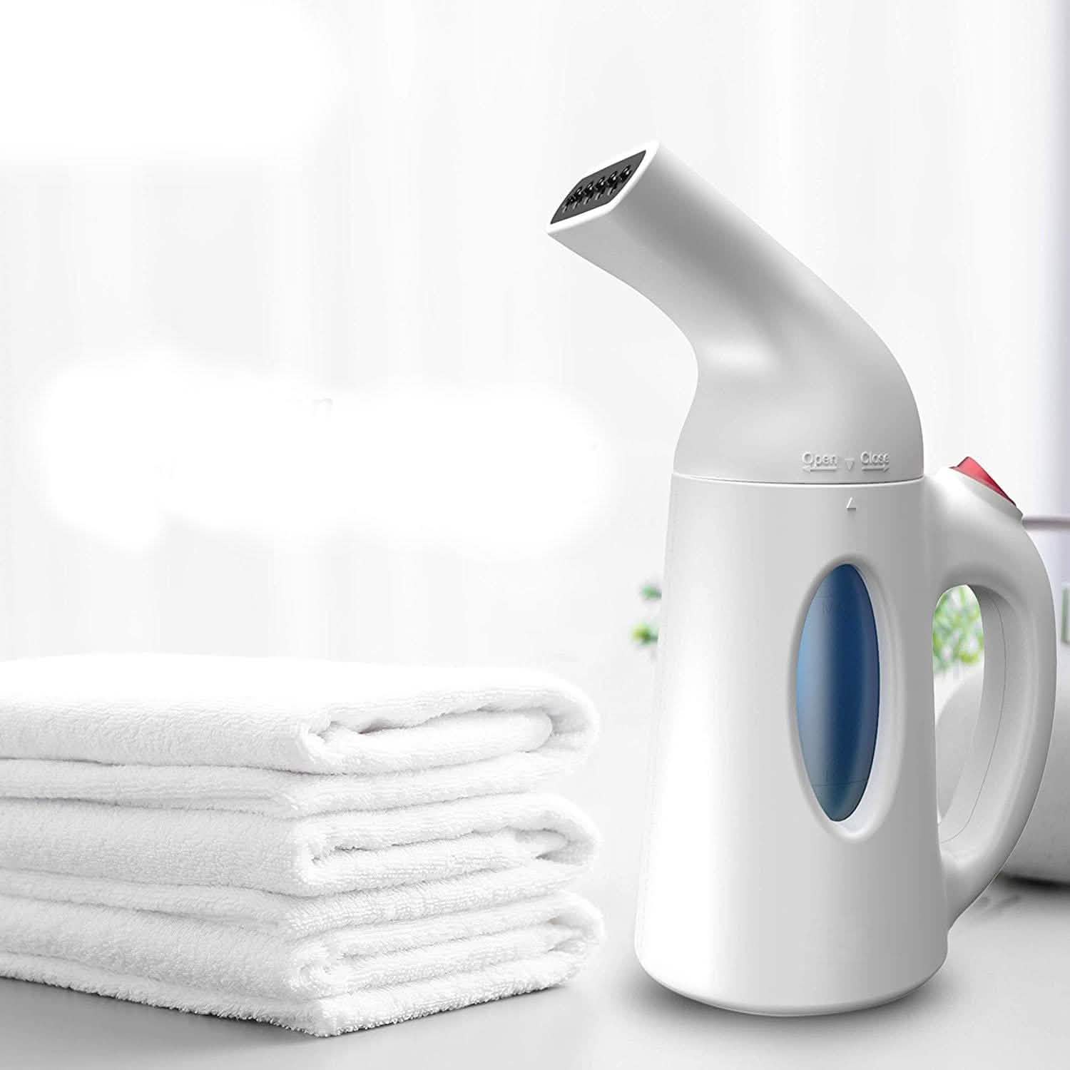 Défroisseur vapeur portatif en tissu