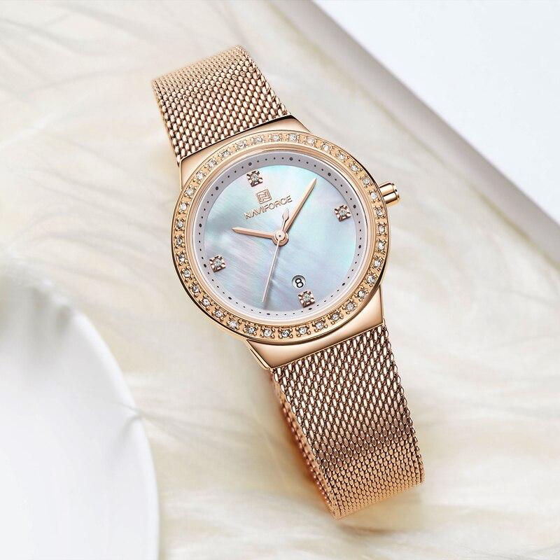 Montres élégantes de mode Montre analogique de luxe pour femme avec date Montre-bracelet décontractée à quartz avec bracelet en maille d'acier inoxydable Cadeau parfait