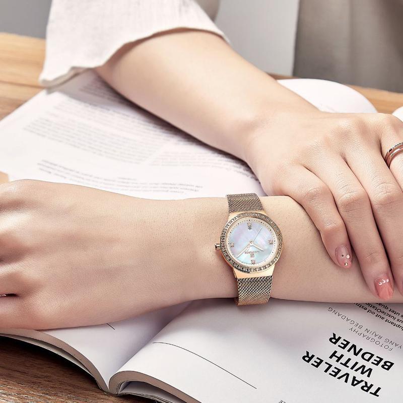 Montres élégantes de mode Montre analogique de luxe pour femme avec date Montre-bracelet décontractée à quartz avec bracelet en maille d'acier inoxydable Cadeau parfait