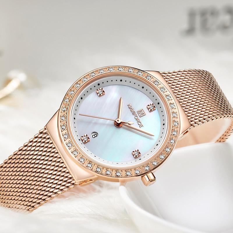 Montres élégantes de mode Montre analogique de luxe pour femme avec date Montre-bracelet décontractée à quartz avec bracelet en maille d'acier inoxydable Cadeau parfait