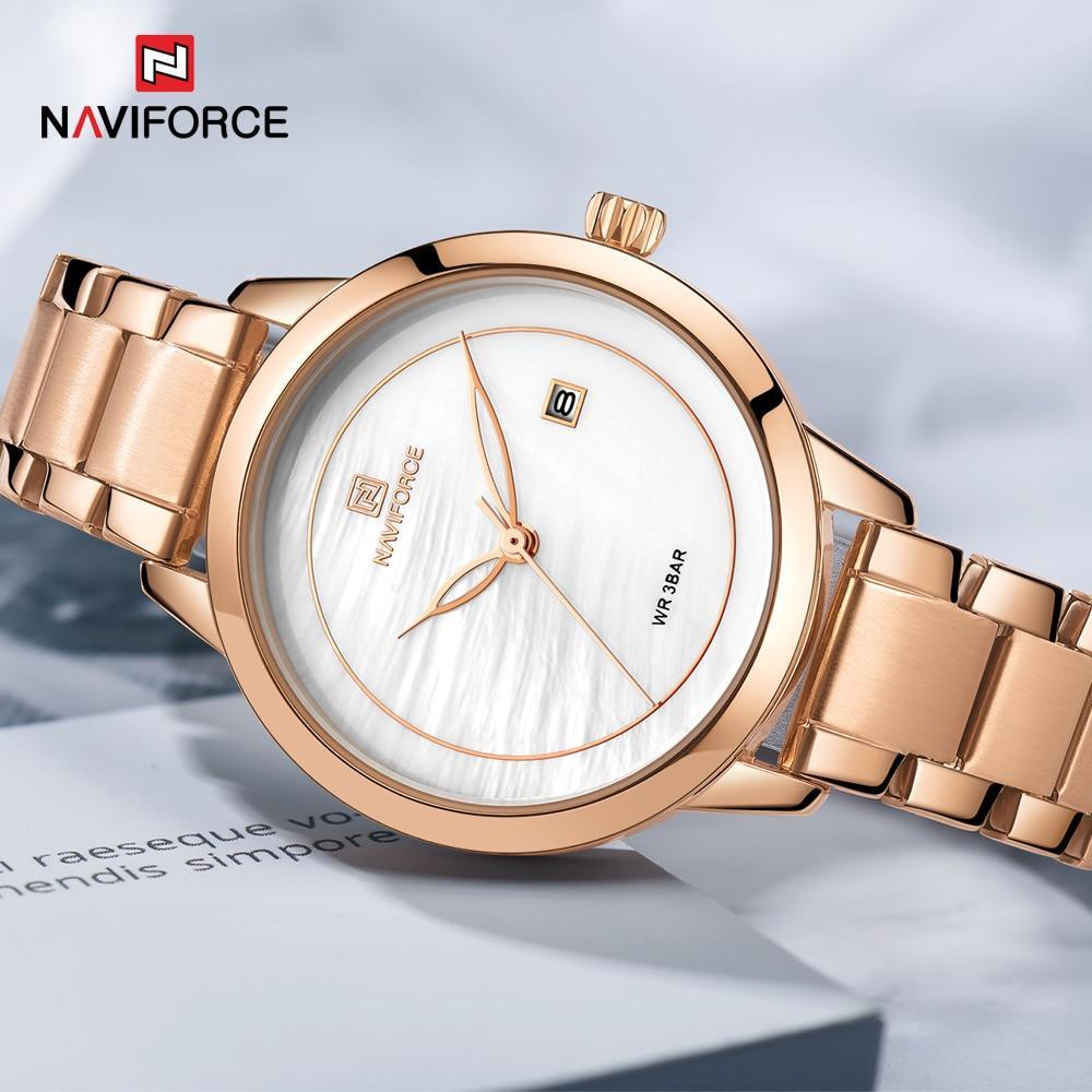 Montre moderne de luxe étanche en acier inoxydable pour femme avec fond à motif marbré