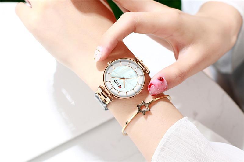 Montres de luxe pour femmes avec un excellent arrière-plan et des designs en zircon, montre-bracelet de style professionnel, cadeau parfait pour elle