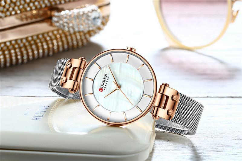 Montres de luxe pour femmes avec un excellent arrière-plan et des designs en zircon, montre-bracelet de style professionnel, cadeau parfait pour elle