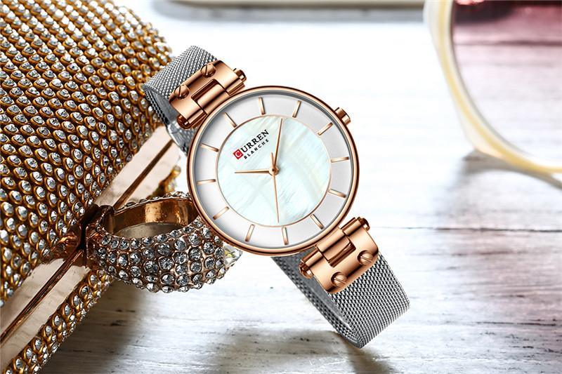 Montres de luxe pour femmes avec un excellent arrière-plan et des designs en zircon, montre-bracelet de style professionnel, cadeau parfait pour elle