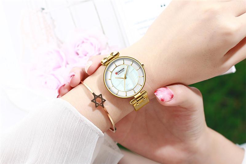 Montres de luxe pour femmes avec un excellent arrière-plan et des designs en zircon, montre-bracelet de style professionnel, cadeau parfait pour elle