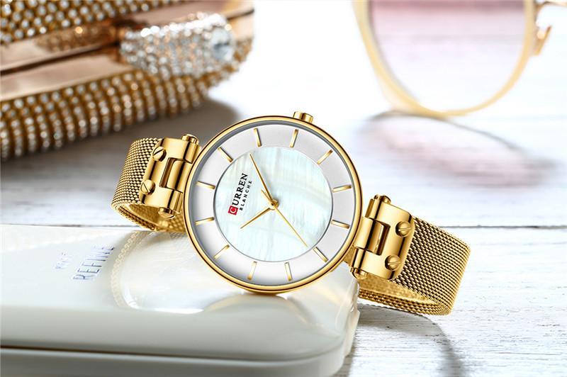 Montres de luxe pour femmes avec un excellent arrière-plan et des designs en zircon, montre-bracelet de style professionnel, cadeau parfait pour elle