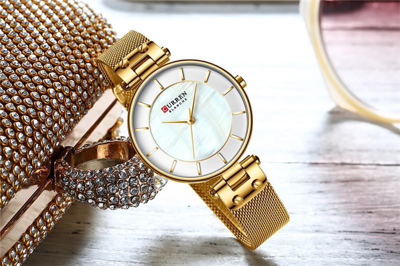 Montres de luxe pour femmes avec un excellent arrière-plan et des designs en zircon, montre-bracelet de style professionnel, cadeau parfait pour elle