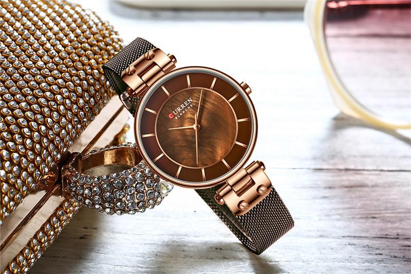 Montres de luxe pour femmes avec un excellent arrière-plan et des designs en zircon, montre-bracelet de style professionnel, cadeau parfait pour elle