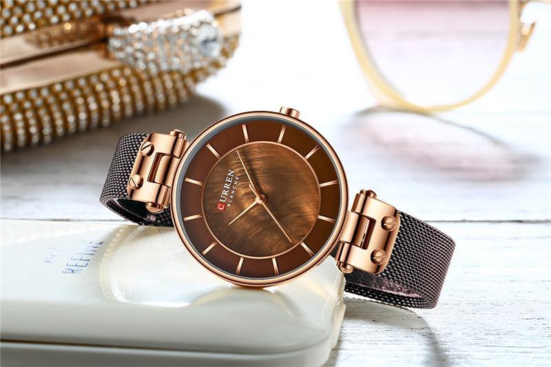 Montres de luxe pour femmes avec un excellent arrière-plan et des designs en zircon, montre-bracelet de style professionnel, cadeau parfait pour elle