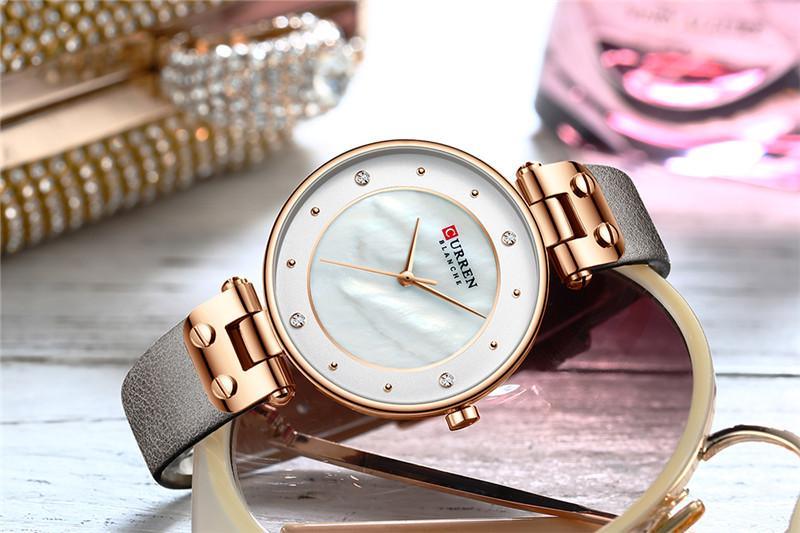 Montres de luxe pour femmes avec un excellent arrière-plan et des designs en zircon, montre-bracelet de style professionnel, cadeau parfait pour elle
