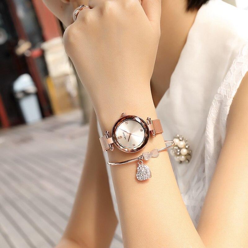 Montre de luxe pour femme, couleur or rose, analogique, design rond étincelant et élégant, bracelet en acier inoxydable.