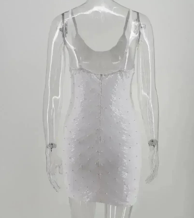 Robe à sequins, jupe à sequins extensible, dos ouvert, fines bretelles perlées