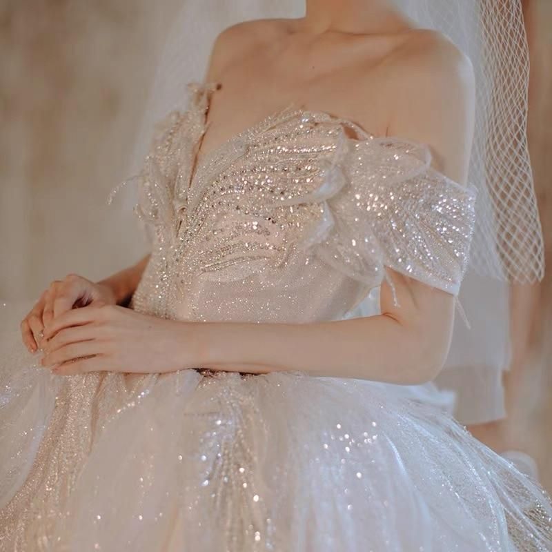 Robe de mariée de luxe élégante avec perles et sequins