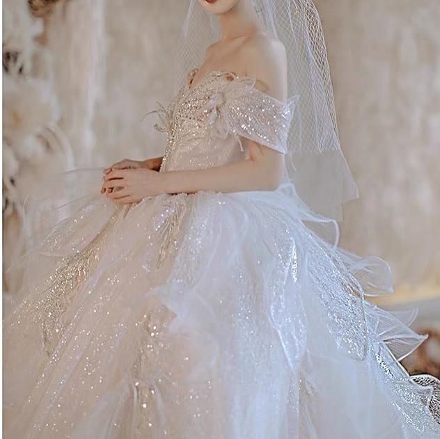 Robe de mariée de luxe élégante avec perles et sequins