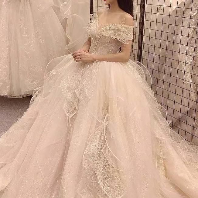 Robe de mariée de luxe élégante avec perles et sequins