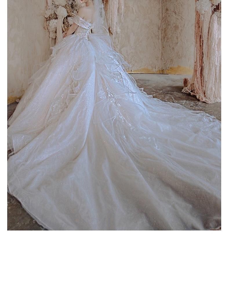 Robe de mariée de luxe élégante avec perles et sequins