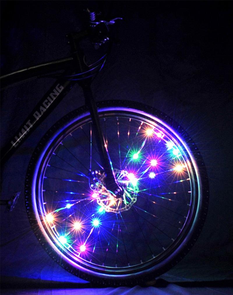 Lampe à rayons de vélo durable à la mode Lumières de roue à vent de pneu de vélo Lumières de ruban à rayons flash Lampe de cyclisme de nuit en plein air Bande lumineuse étanche lumineuse pour rayons de roue de vélo
