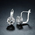 Boucles d'oreilles créoles huggie en rhodium et cristaux Swarovski