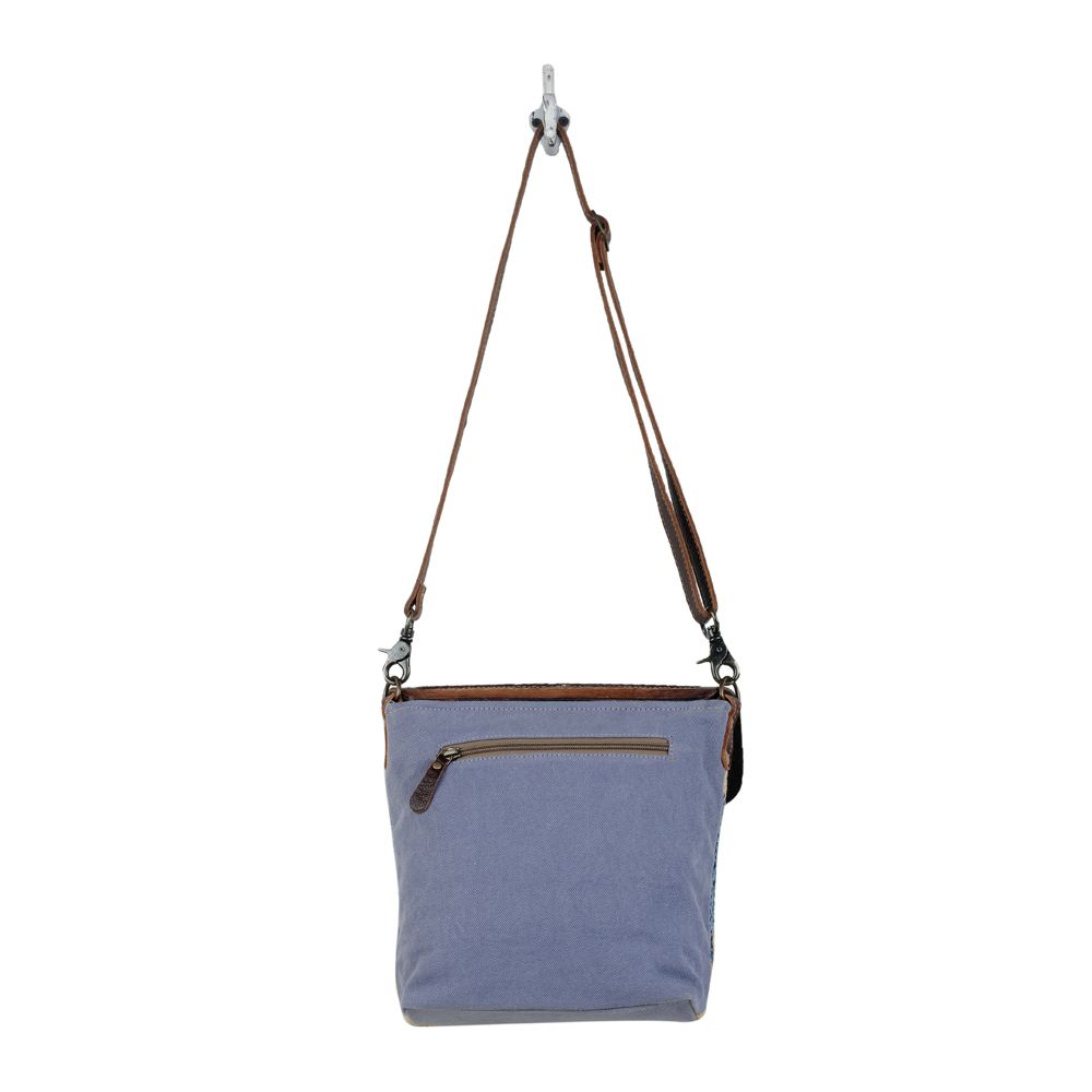 SAC EN CUIR REPOUSSÉ PLUME BLEUE