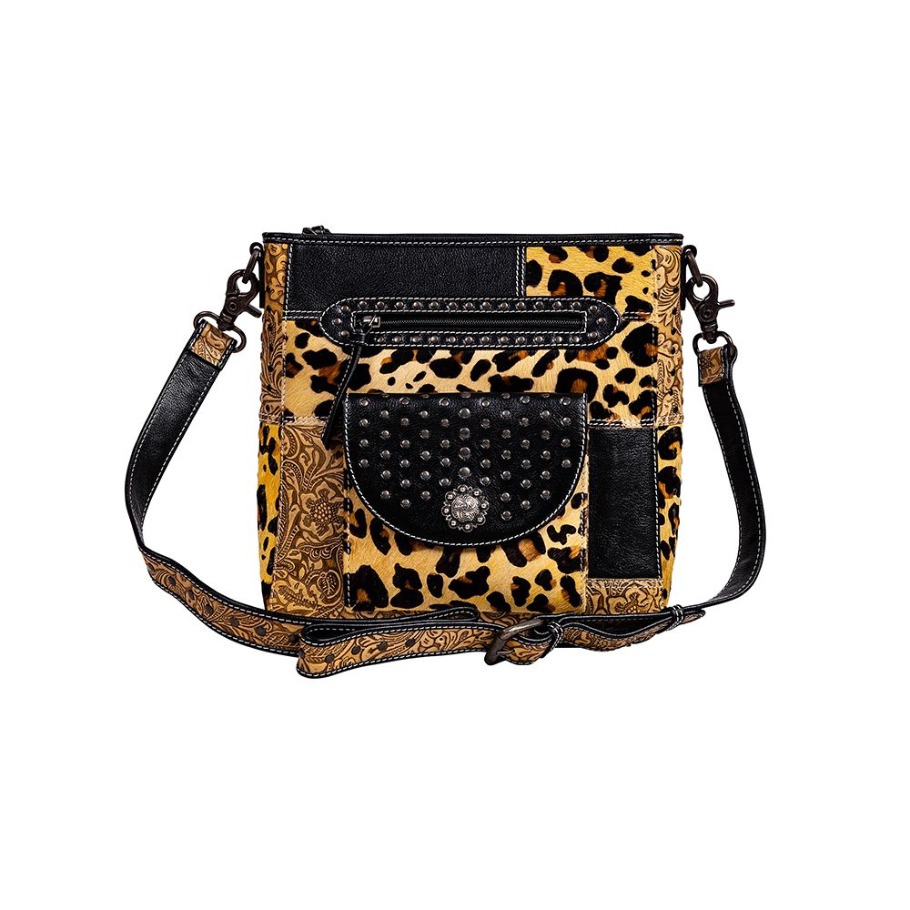 Sac en cuir et poils de veau orné de motifs Jaguar