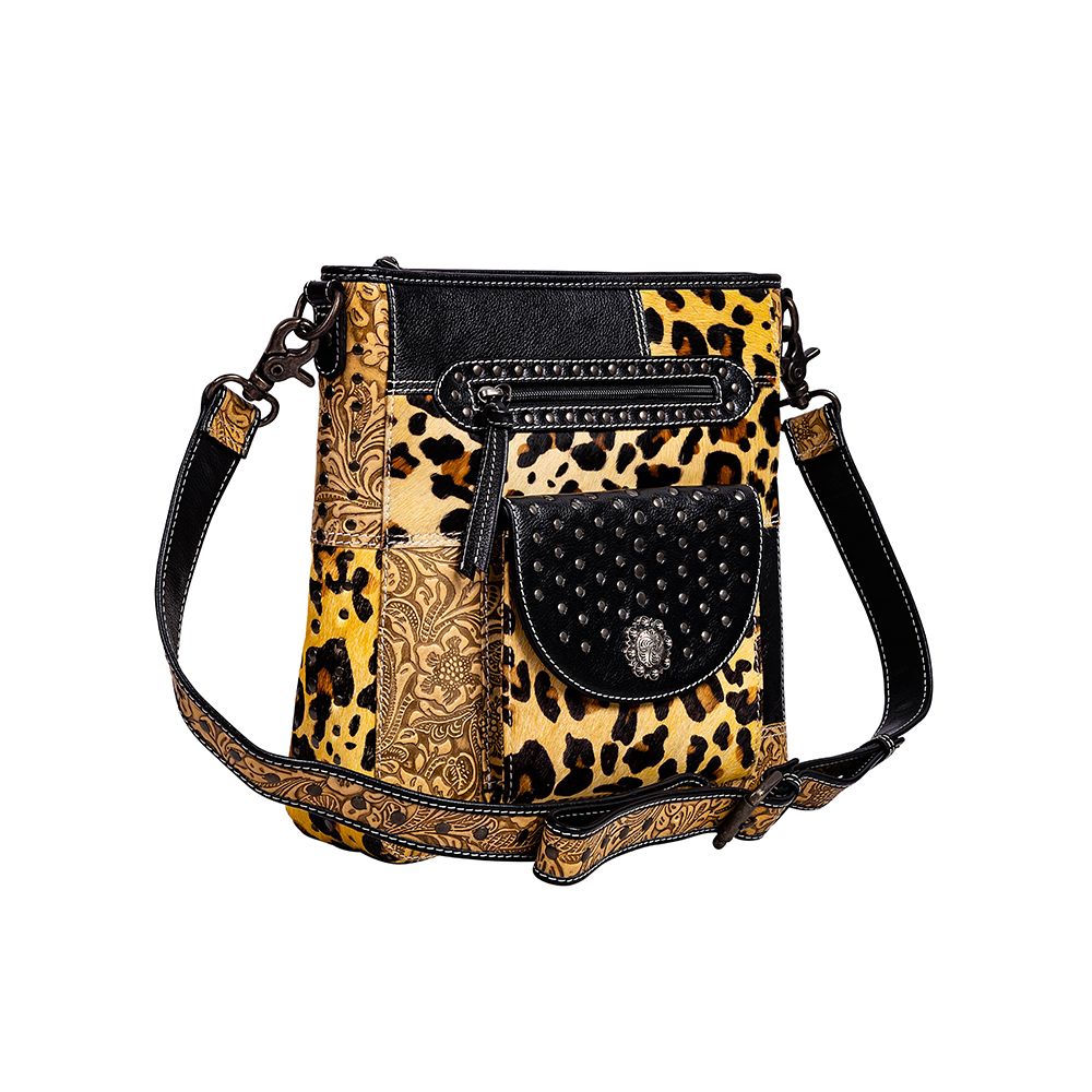 Sac en cuir et poils de veau orné de motifs Jaguar