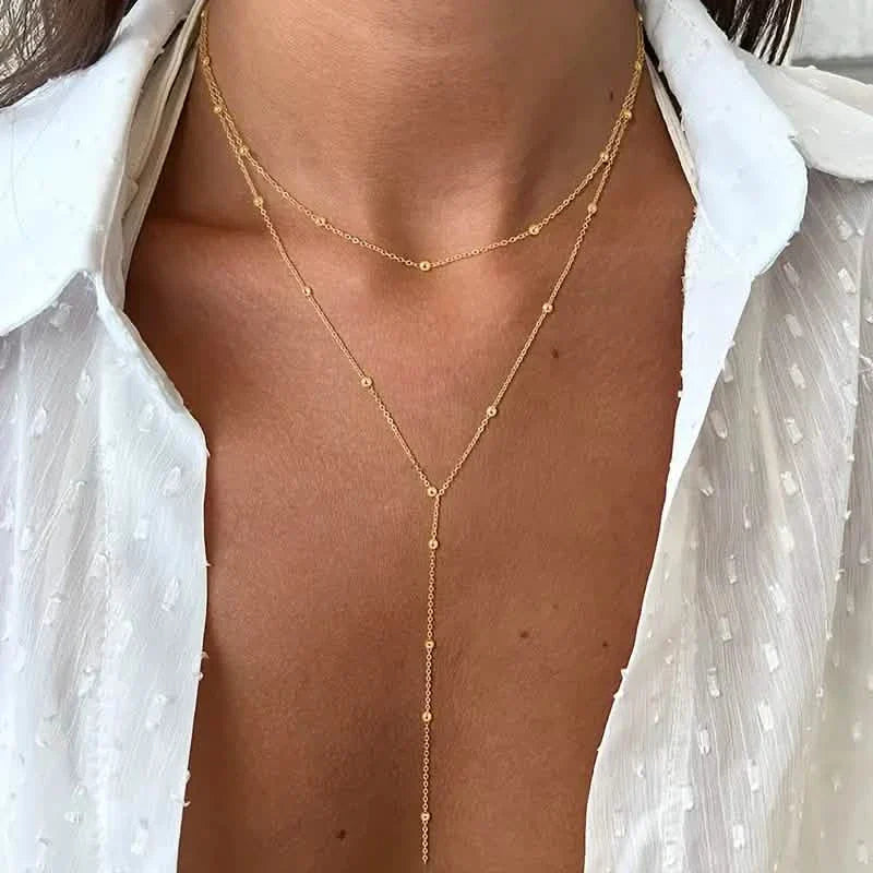 Chaîne en fer sexy de style tribal avec pendentif pompon suspendu