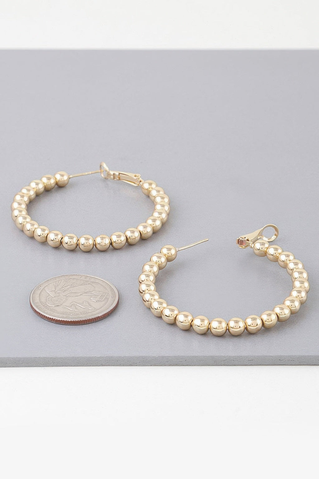 Boucles d'oreilles créoles perlées brillantes