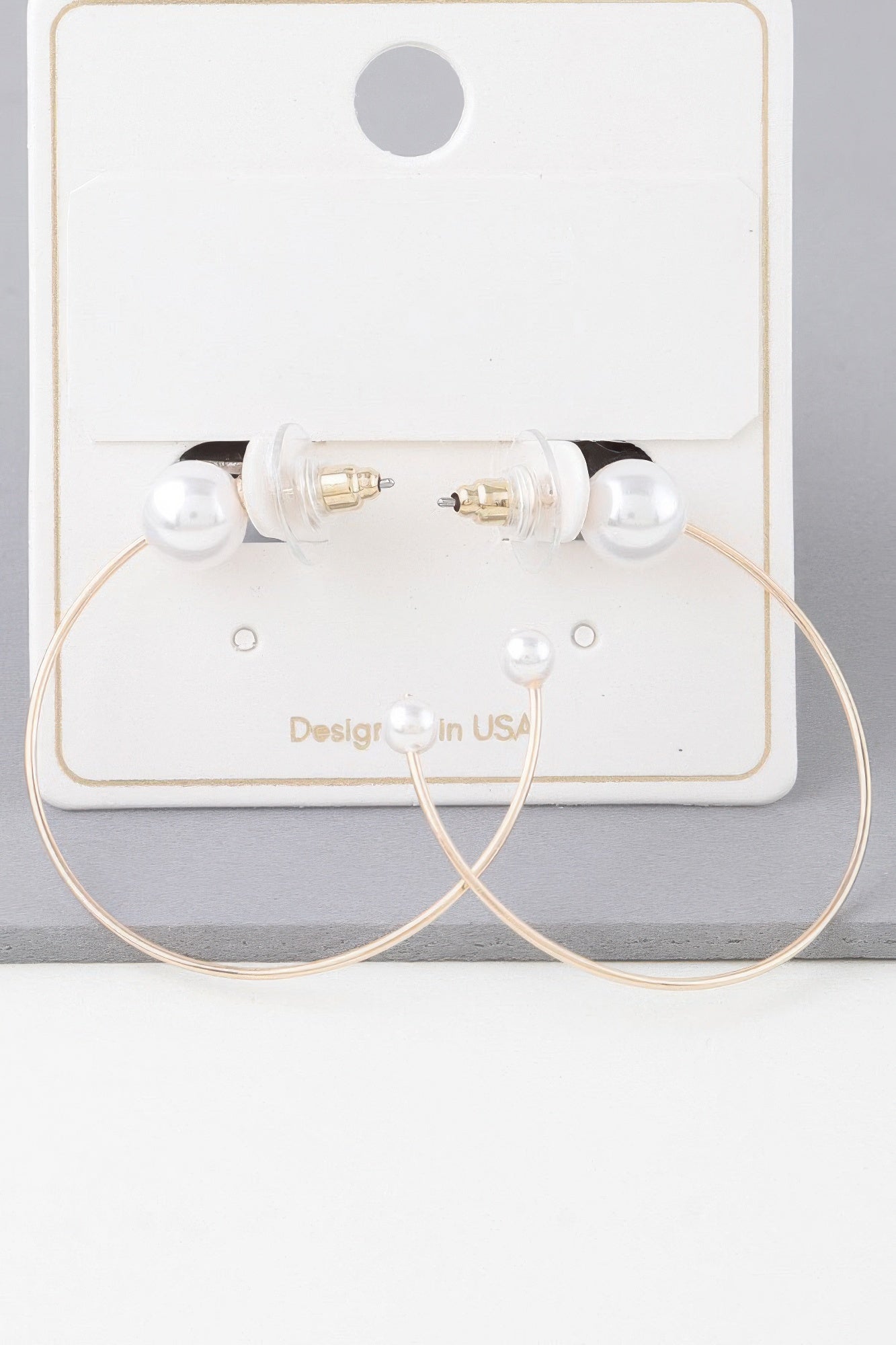 Boucles d'oreilles créoles perles délicates et brillantes