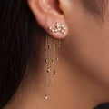 Boucles d'oreilles longues à pampilles avec strass étoile filante