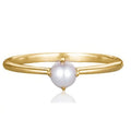 Bague simple et délicate en perle et or 18 carats
