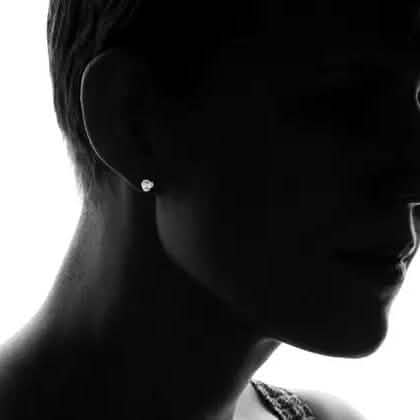 Clous d'oreilles en argent sterling massif Nœud d'Amour
