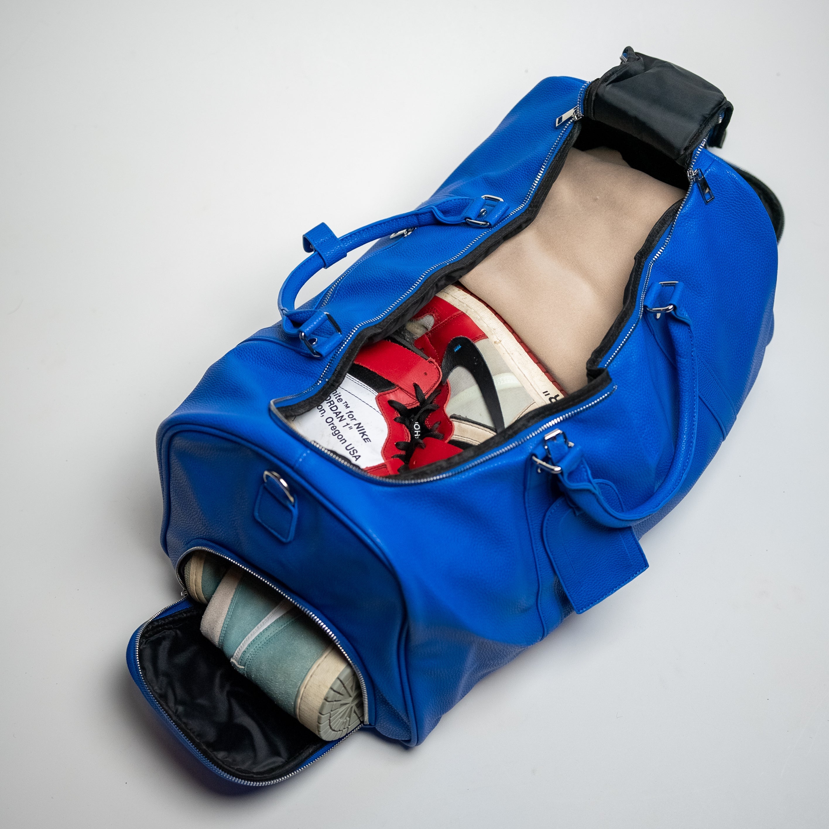Sac de voyage en cuir bleu roi