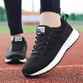 Chaussures décontractées de sport pour femme, à la mode, respirantes, en maille, plates, pour la gym, vulcanisées, pour la marche, légères, confortables et tendance.