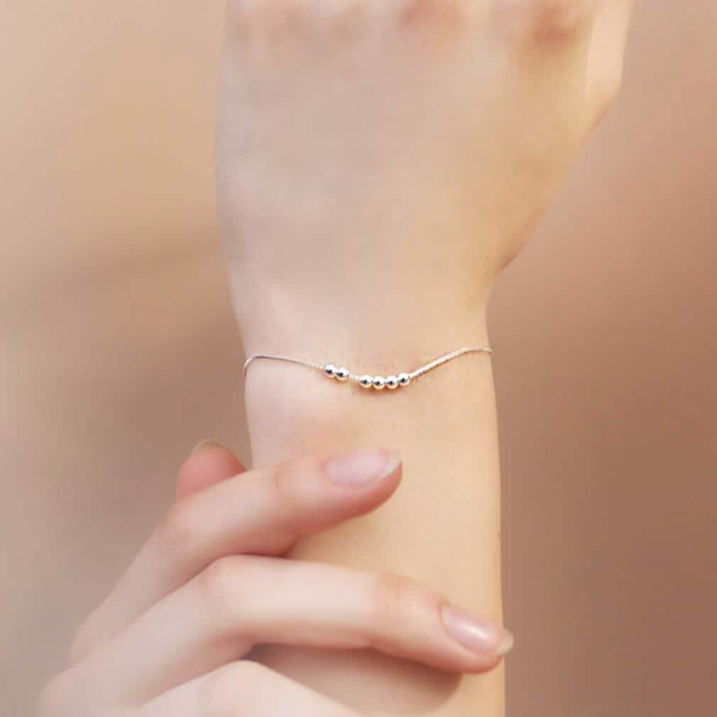 Bracelet à breloques perles et boules en argent sterling