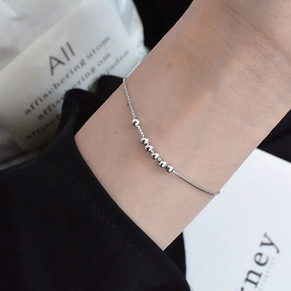 Bracelet à breloques perles et boules en argent sterling