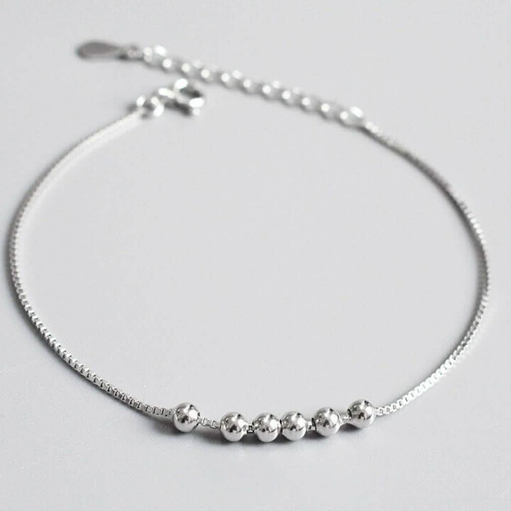 Bracelet à breloques perles et boules en argent sterling